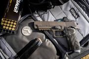 SIG Sauer Legion pistol with ammo and gear